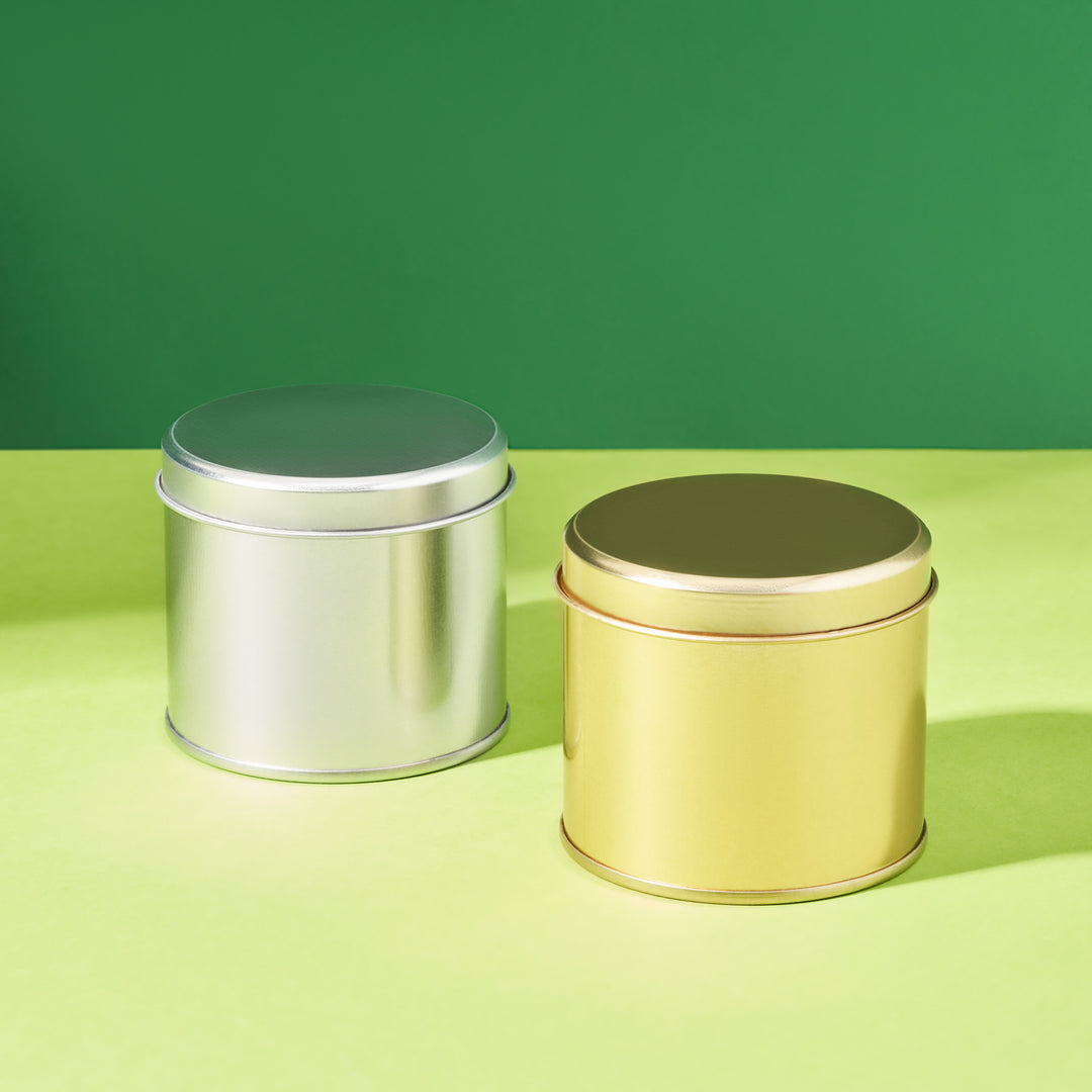 Boîte métallique ronde élancée à soudure latérale disponible en doré ou argenté