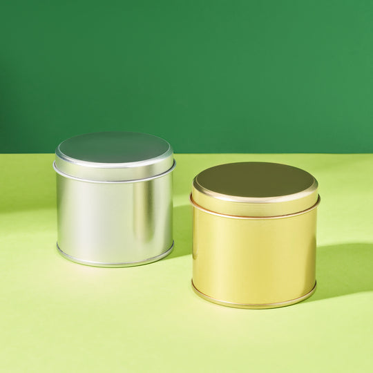 Boîte métallique ronde élancée à soudure latérale disponible en doré ou argenté